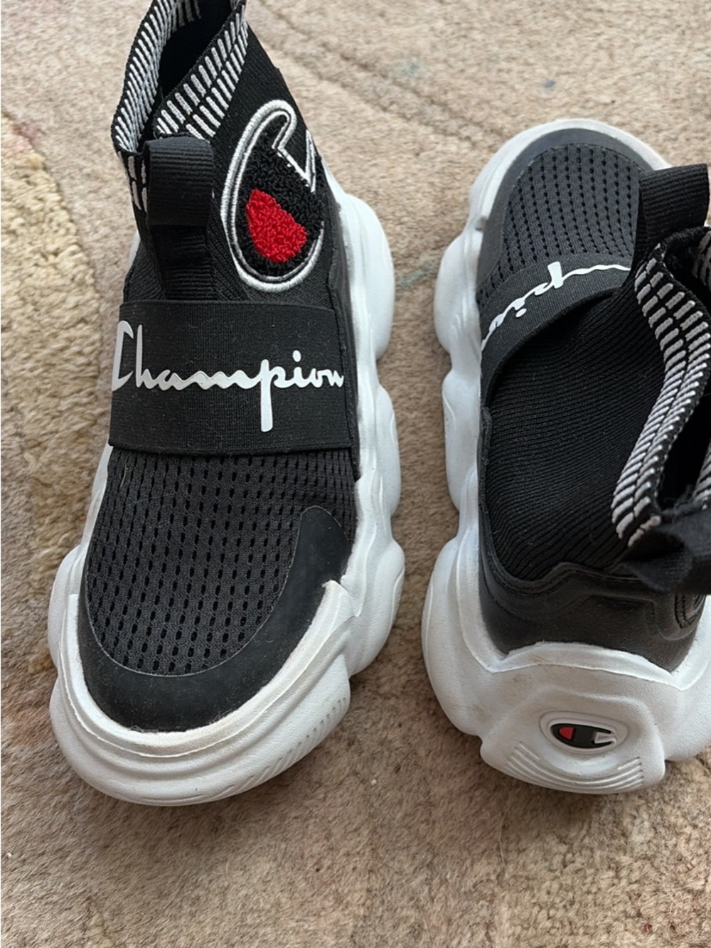 Champion Kids Black and White Slip-On Sneakers with Red Logo Patch